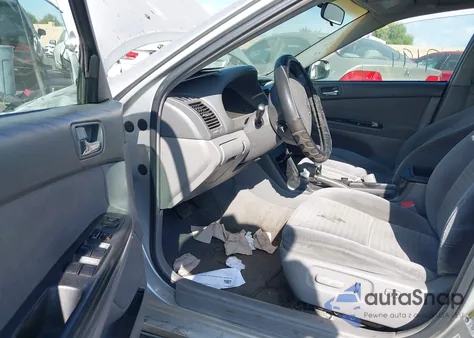 2005 Toyota Camry Le z USA, uszkodzony, nr VIN 4T1BE32K65U558165